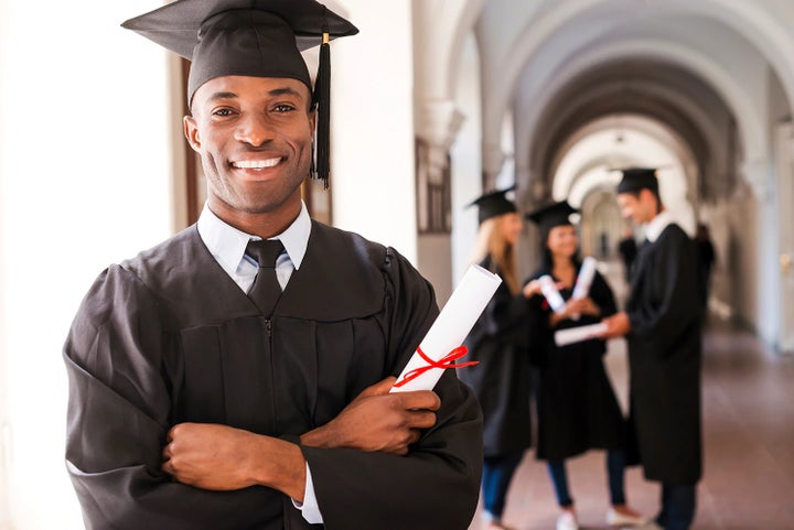 college graduate holding his diploma | Victory Subaru in Somerset NJ