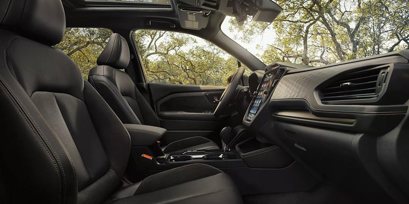 2026 Subaru Forester interior showing front seats and dashboard