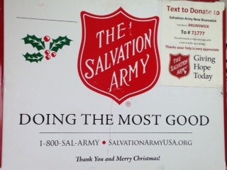 Salvation Army donation box with Doing The Most Good and Giving Hope Today.